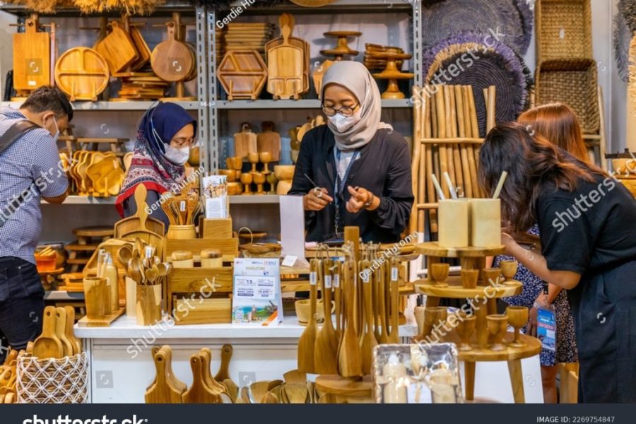 stock-photo-jakarta-indonesia-march-nd-a-customer-is-looking-at-various-kind-of-woodwork-at-2269754847